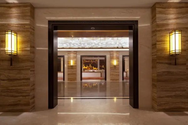 Airport JianGuoYinPu Hotel 77